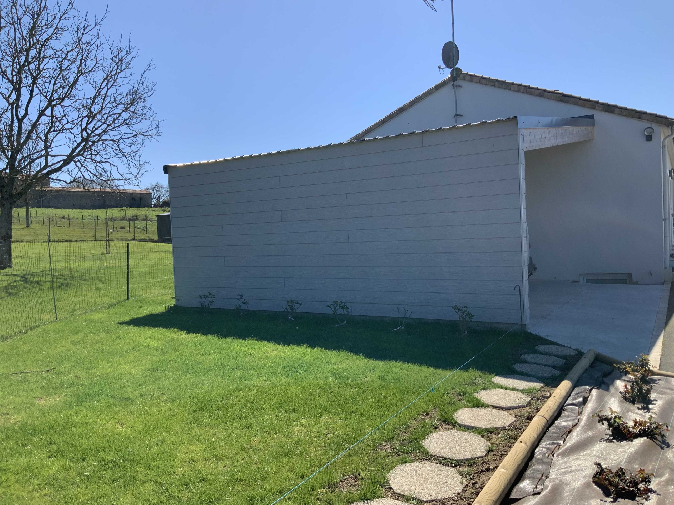 Carport en ossature bois avec bardage